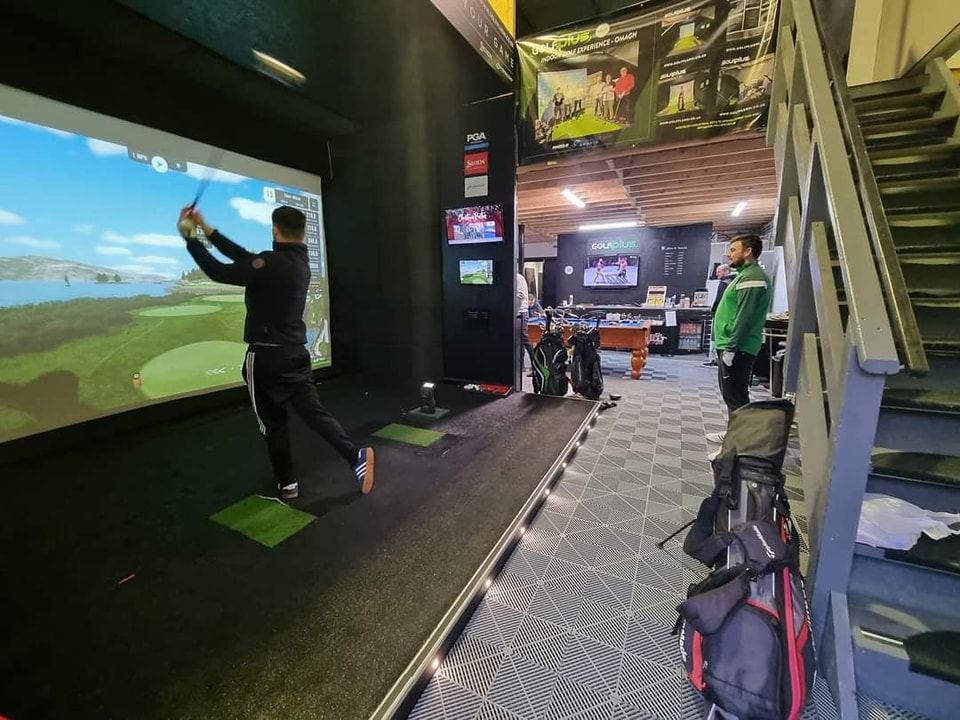 Indoor golf simulator bay at Golfplus Omagh